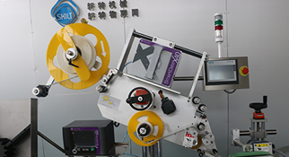 苏州自动贴标机使用透明不干胶标签出现了起泡问题怎么办，应该如何避免？