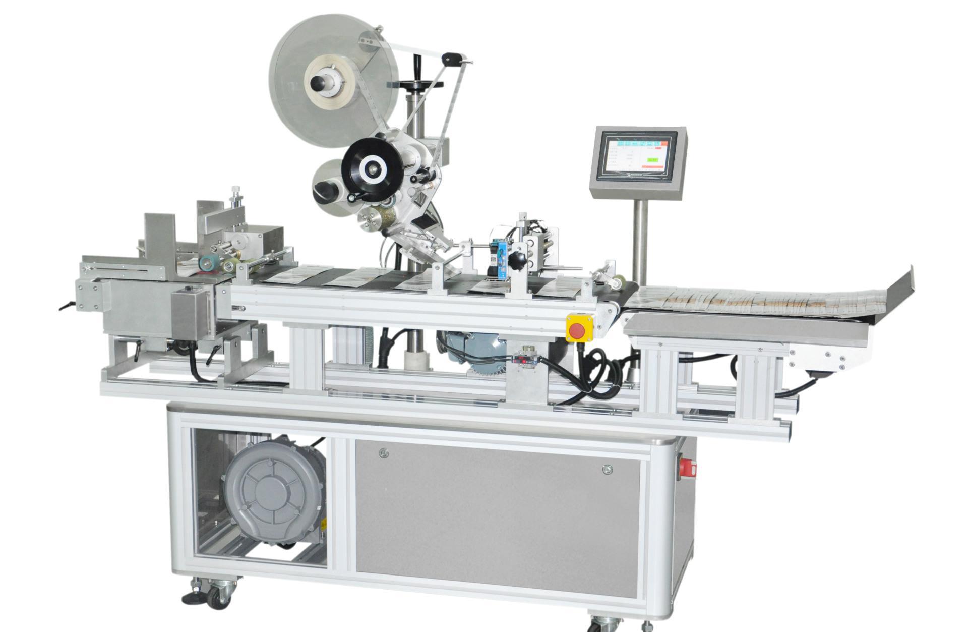 纸盒拐角贴标机介绍